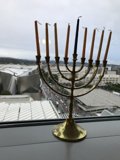 Golden Hanukkah Menorah Shines Outdoors