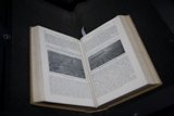 Open Book on Black Table