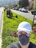 Hard Hat and Face Mask on the City Streets