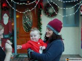 A Cherished Moment by the Christmas Tree