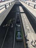 Green Car Parked Under Bridge in LA