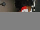Red Shirt Man in Electronics Store