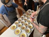 Tattooed Man Serving Brunch