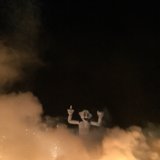 White Statue Shines Under Night Sky