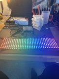 Multicolored LED Display Illuminating a Modern Desk