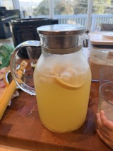 Homemade Lemonade Pitcher on Rustic Wooden Table
