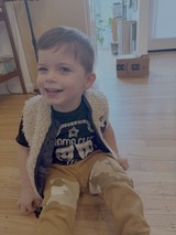 Joyful Child in Living Room Play Area