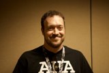 Happy Man with a Beard and Black T-Shirt