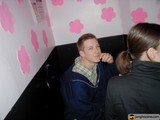 Man with a Pink Flower in the Bathroom