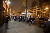 Hungry Crowd Gathers At Night