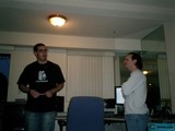 Two Men Discussing in a Well-Equipped Room