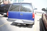 Blue Van in Parking Lot