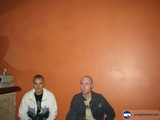 Relaxing in Front of an Orange Wall