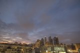 Cityscape and Cumulus Clouds