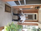 Man on Porch Bench