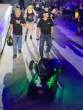 Man walks with robot on Las Vegas stage
