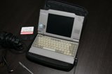 Vintage Laptop Computer with Accessories