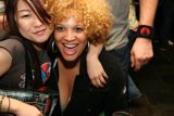 Nightlife Fun with Curly-Haired Woman