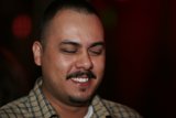 The Smiling Mustachioed Man