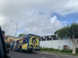 Rainbow Truck on the Side of the Road