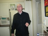 Eric W Poses with Electrical Household Appliances