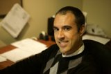 A Happy Man at the Desk