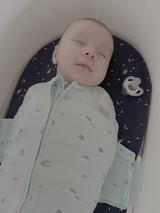 Peaceful Sleeping Newborn Baby in Crib