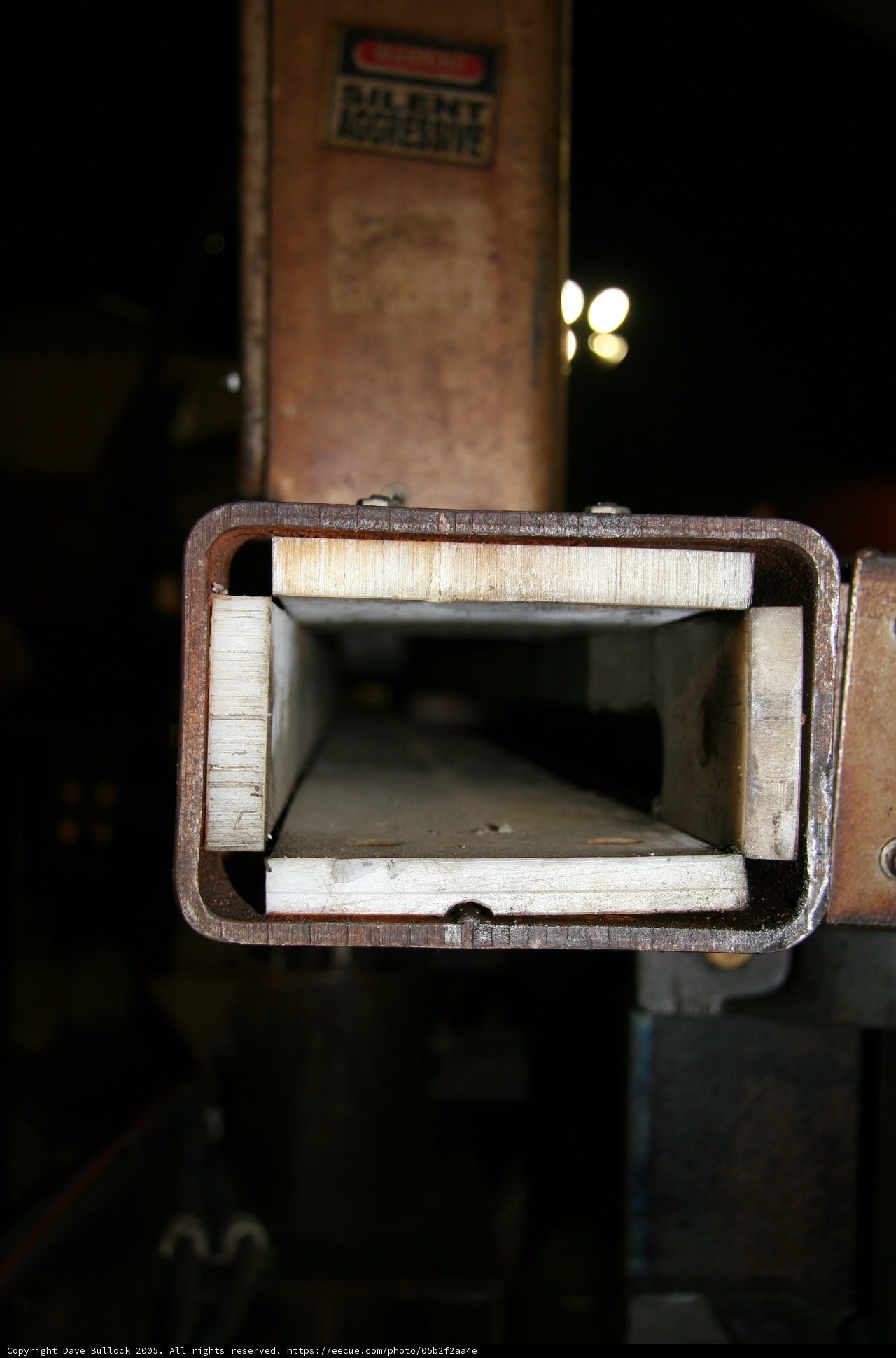 Rusty Metal Mailbox with a Hole