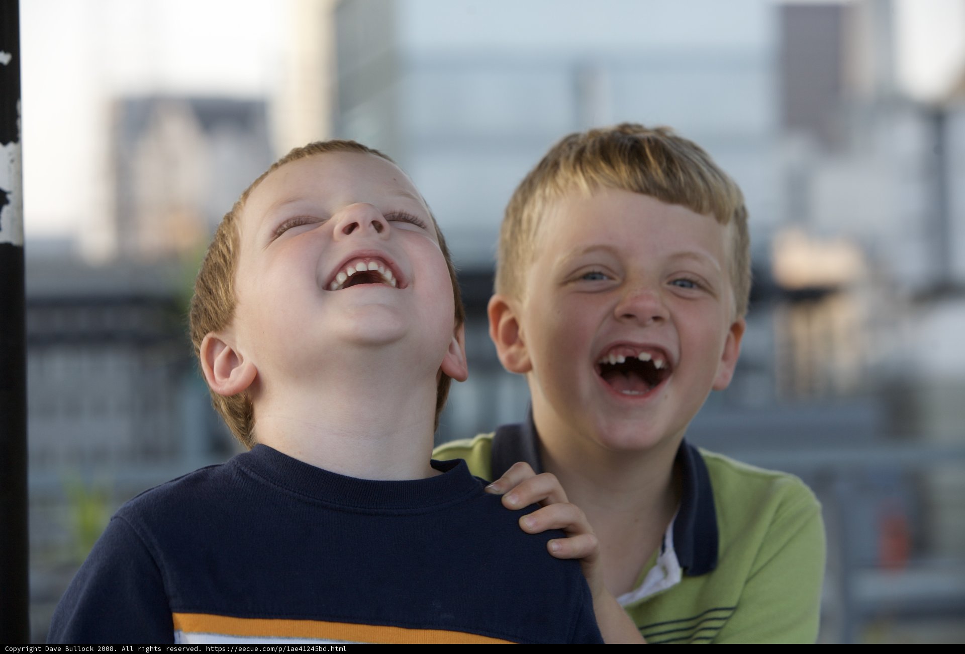 Two Boys Sharing Laughter Together