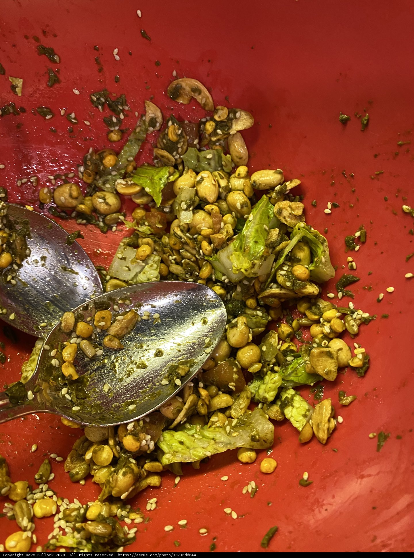 Red bowl of lentil and seafood stew