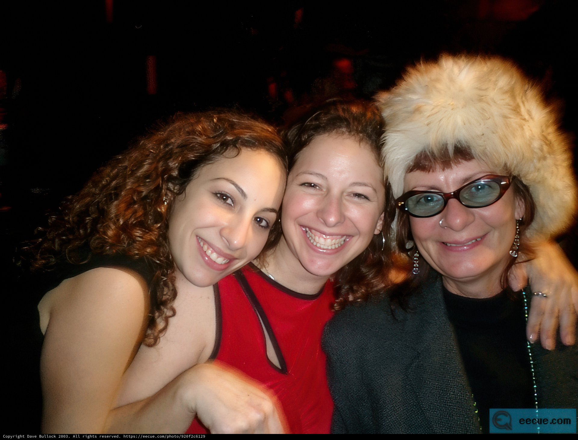 Three Smiling Women in Stylish Eyewear