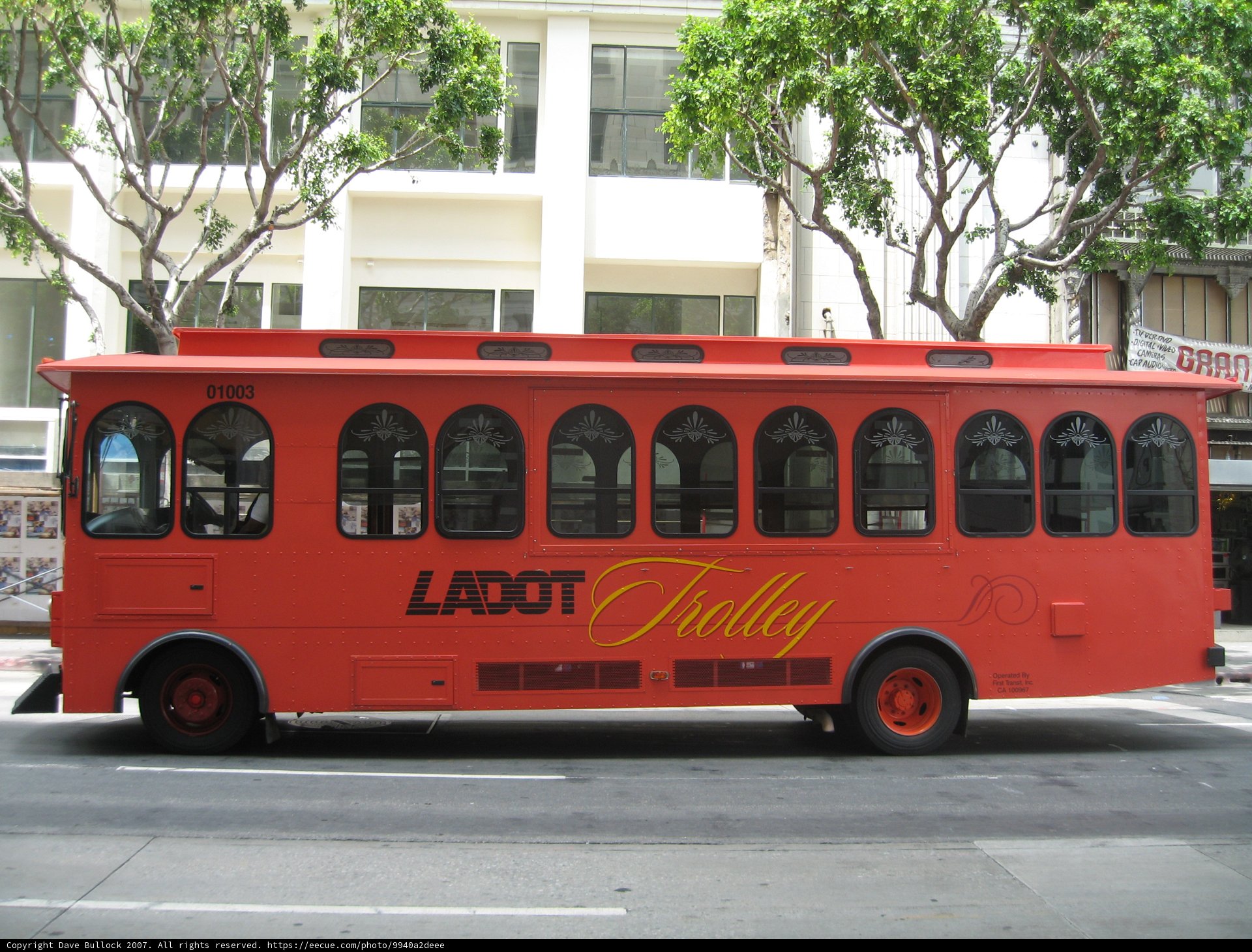 Red Bus Resting on the Roadside