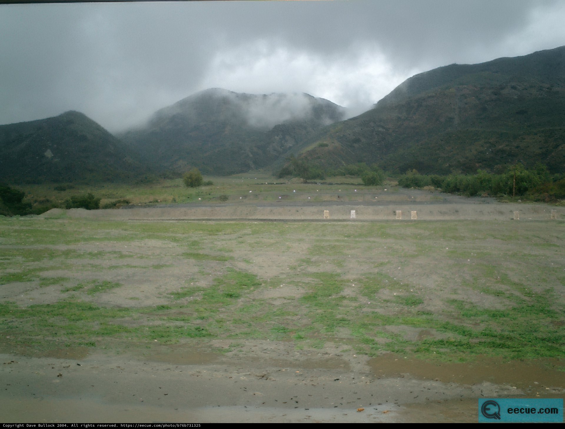 Majestic mountain range and expansive field