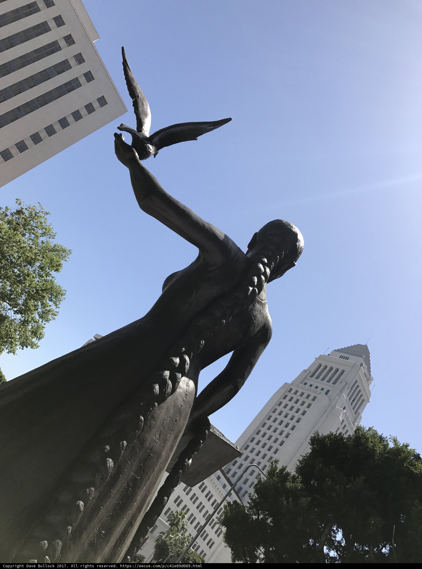 Statue of a Woman with a Bird