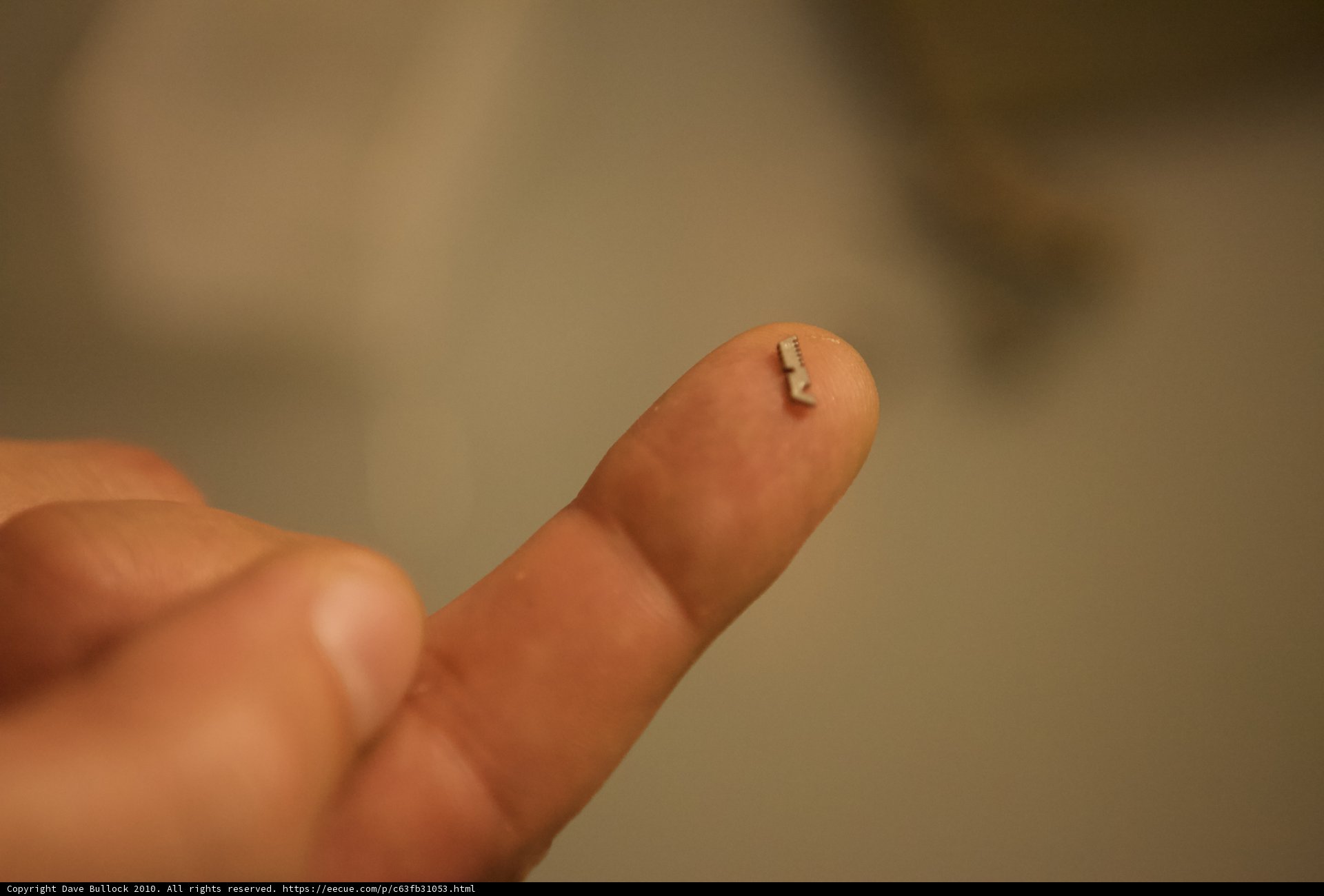 Tiny Screw in Finger