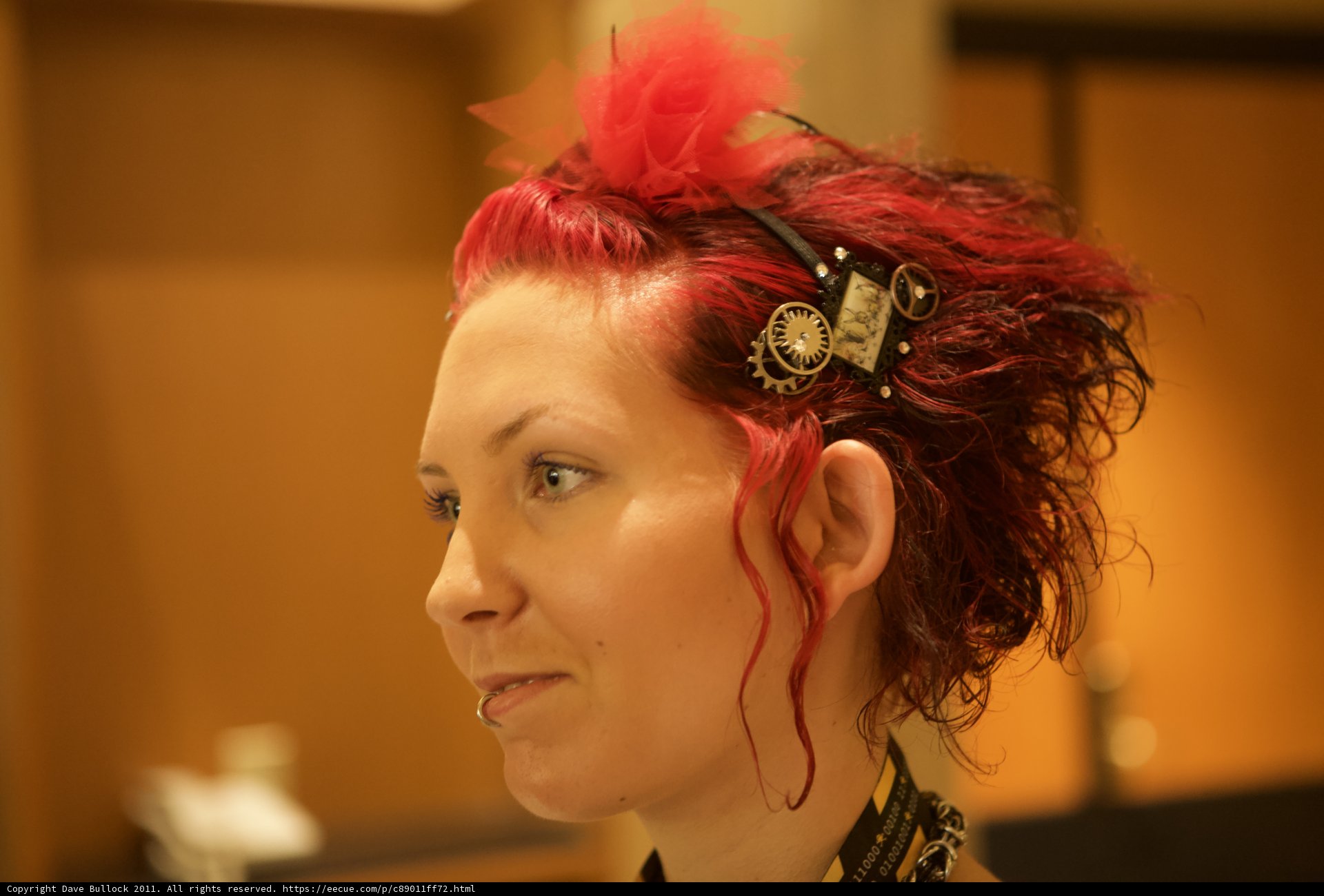 Red-Haired Beauty with Statement Necklace