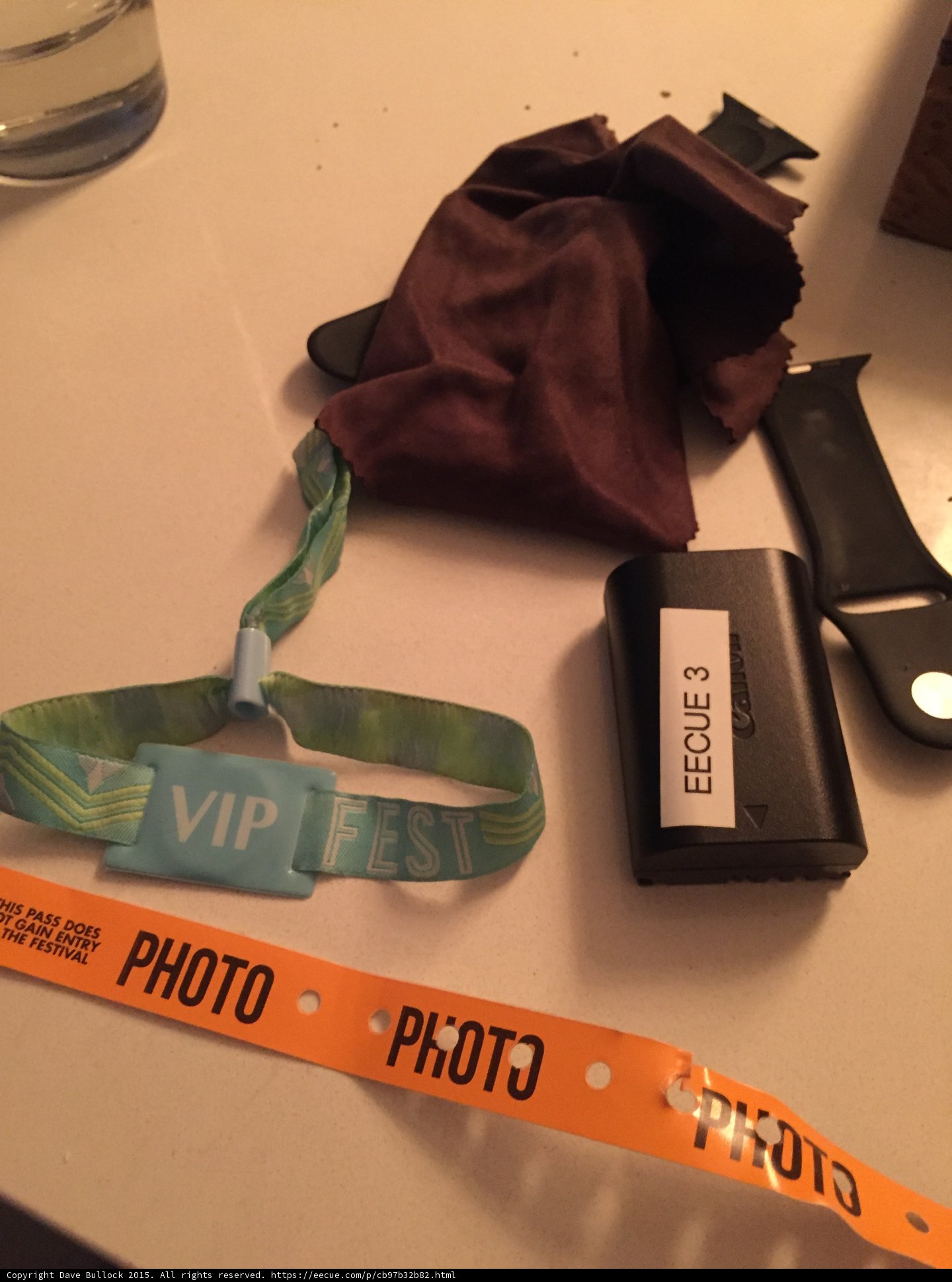 Festival Photography Gear VIP Wristband Photo Pass Canon Battery Apple Watch Lens Cloth Table Still Life Alternate Angle