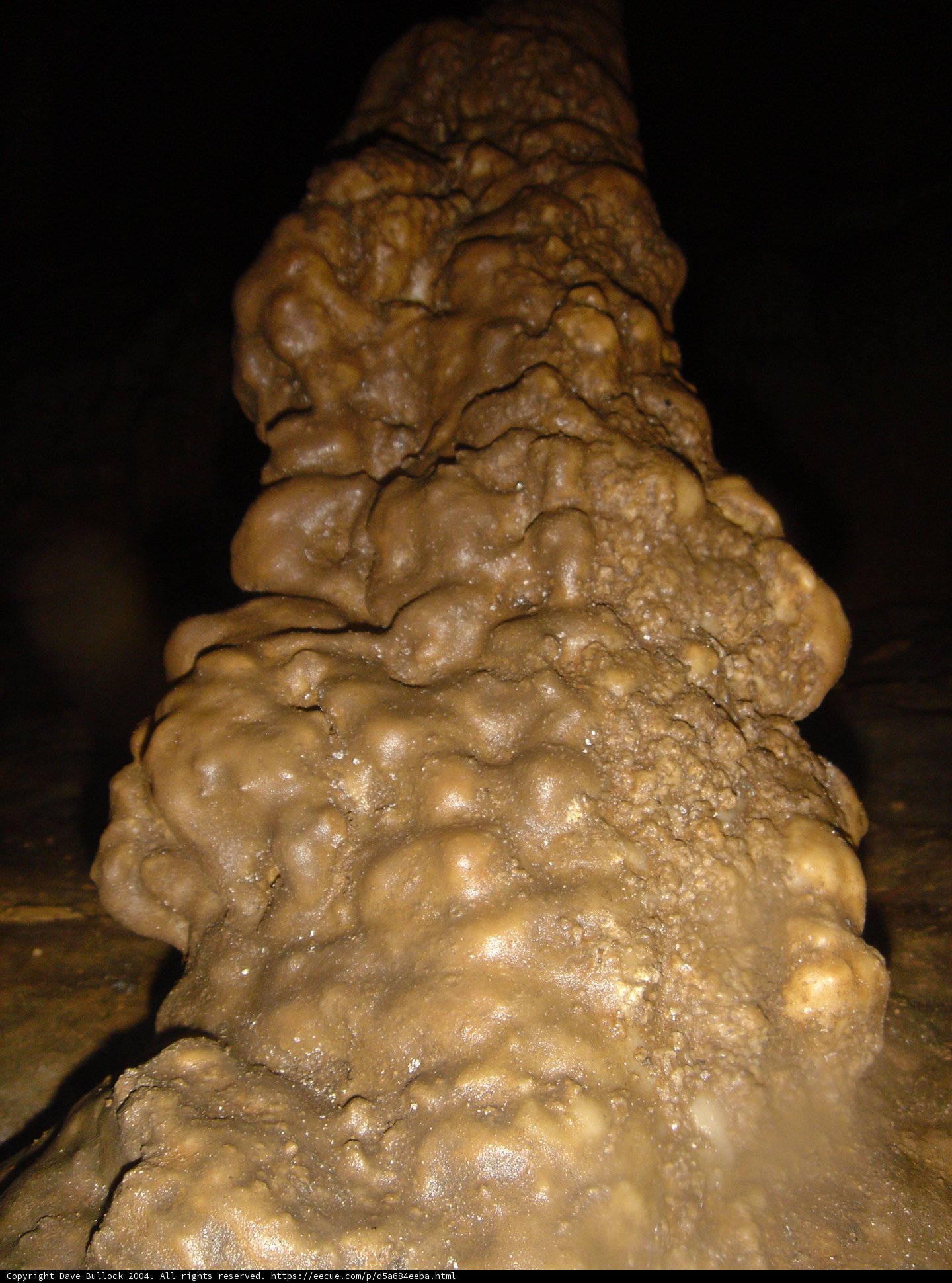 Dirt-Ridden Rock in a Natural Cave