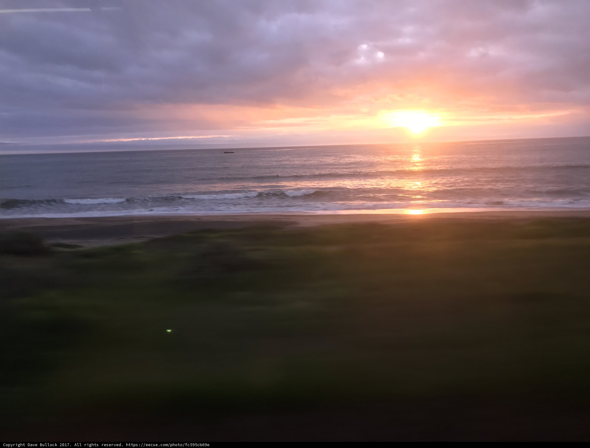 Golden Hour Flare Over the Pacific