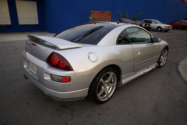 Shining in Silver: The Rear End of a 2007 Eclipse Sports Car