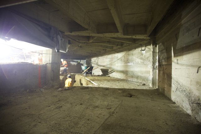 Construction Worker in the Underground Bunker