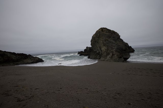 Solitary Sea Stack on Fog-Shrouded California Coast