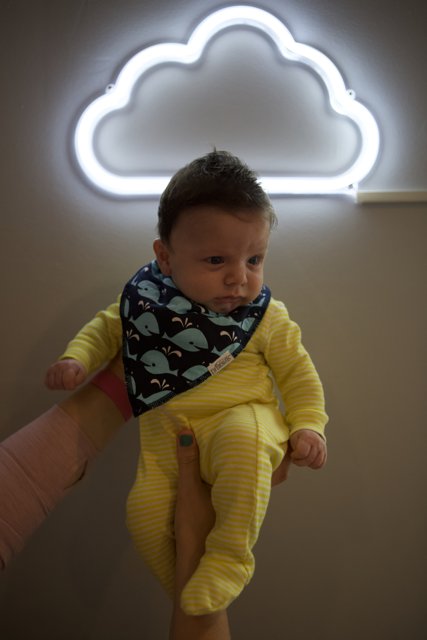 Neon Dreams - Baby Wesley Immersed in Colorful Lights
