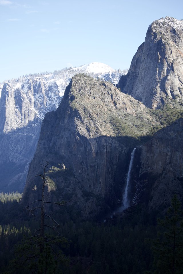 Bridalveil Fall and Snow-Capped Peaks in Yosemite Valley