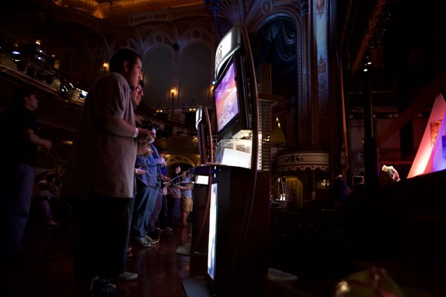 Gaming enthusiasts gather at a pub to watch the latest release