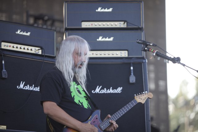 White-Haired Guitarist Takes Center Stage