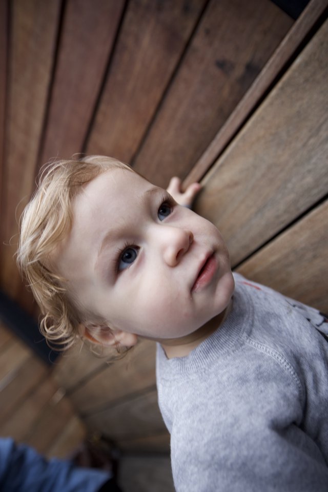 Young Child Looking Up with Wonder and Curiosity
