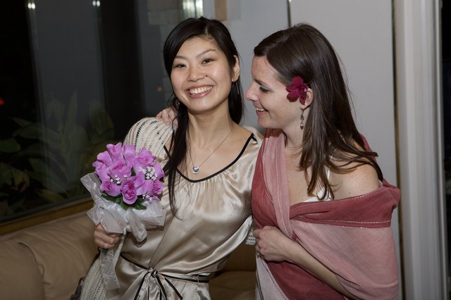 Two Friends Celebrate at a Wedding Reception