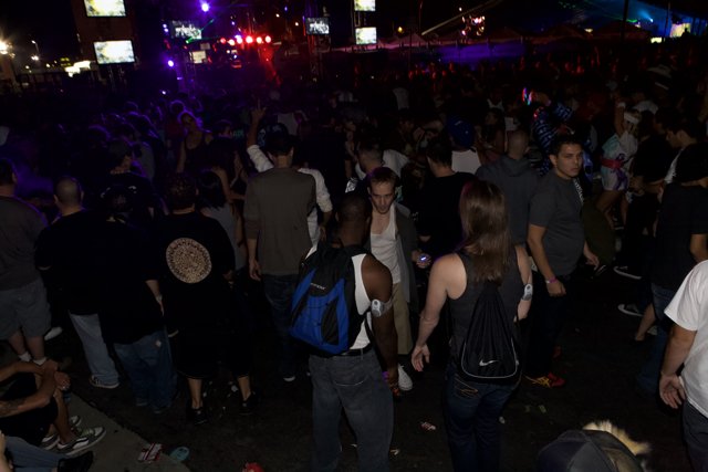 Nightclub Crowd Wearing Urban Accessories
