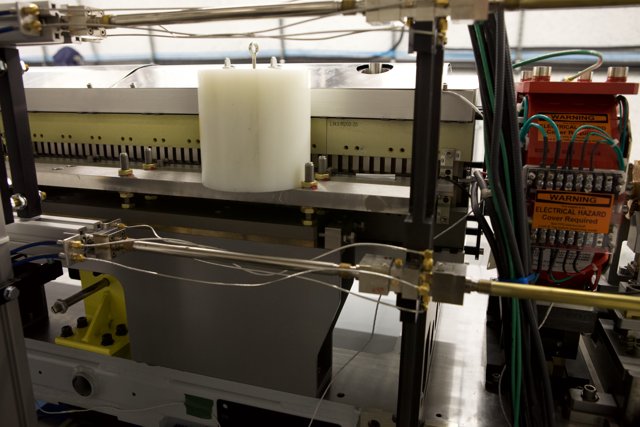 The Candle-Lit Machine in the Factory